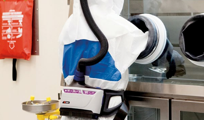 worker in white with versaflo gear