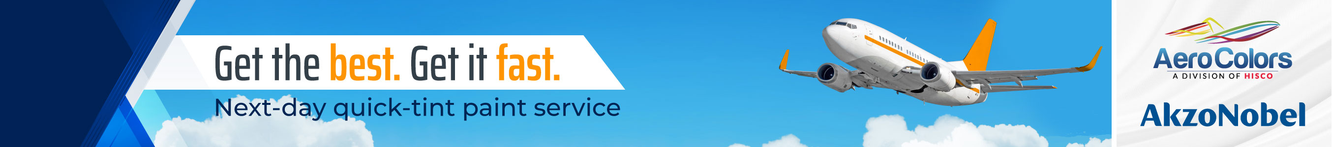 Photo of a red propellor-based plane in a sunny field with the Aero Colors logo on the left.