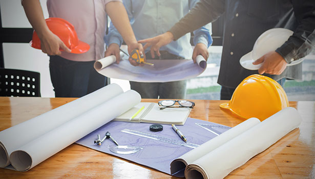 people with blueprints