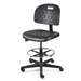 Breva Mid Height Black Polyurethane Chair, Black Nylon Base with Adjustable Footring, Hard Floor Casters