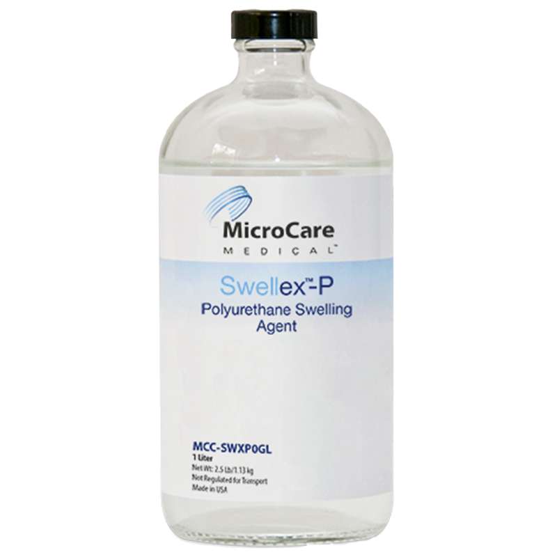 clear bottle of clear liquid with label