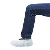 white shoe cover over sneaker and partial leg redirect to product page