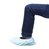 textured white shoe cover over black sneaker redirect to product page