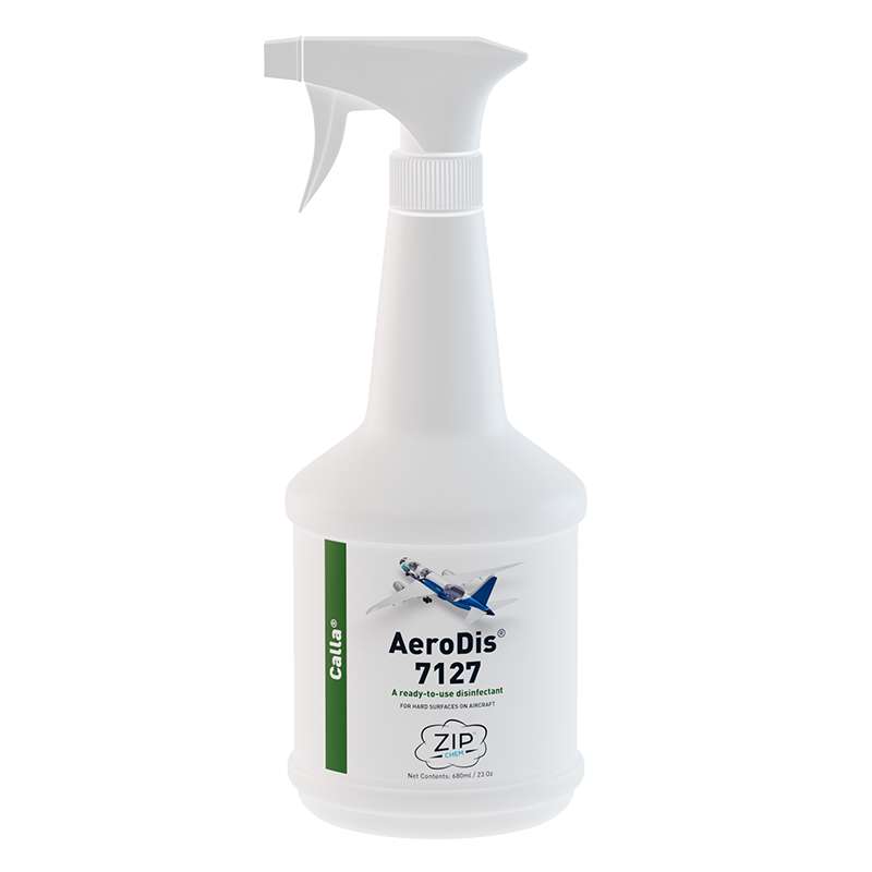 white plastic spray bottle with product label